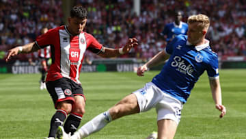 Everton's English defender #32 Jarrad Branthwaite (R) fouls Sheffield United's Brazilian-born Dutch midfielder #08 Gustavo Hamer (L) during the English Premier League football match between Sheffield United and Everton at Bramall Lane in Sheffield, northern England on September 2, 2023. (Photo by Darren Staples / AFP) / RESTRICTED TO EDITORIAL USE. No use with unauthorized audio, video, data, fixture lists, club/league logos or 'live' services. Online in-match use limited to 120 images. An additional 40 images may be used in extra time. No video emulation. Social media in-match use limited to 120 images. An additional 40 images may be used in extra time. No use in betting publications, games or single club/league/player publications. / (Photo by DARREN STAPLES/AFP via Getty Images)