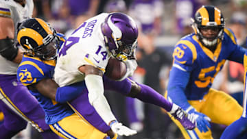 LOS ANGELES, CA - SEPTEMBER 27: Wide receiver Stefon Diggs #14 of the Minnesota Vikings is tackled by defensive back Nickell Robey-Coleman #23 of the Los Angeles Rams during the second quarter at Los Angeles Memorial Coliseum on September 27, 2018 in Los Angeles, California. (Photo by Harry How/Getty Images)