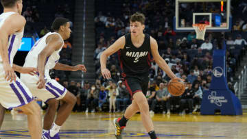 Miami Heat forward Nikola Jovic (5) dribbles against Sacramento Kings forward Keegan Murray (13) during the third quarter at the California Summer League(Darren Yamashita-USA TODAY Sports)