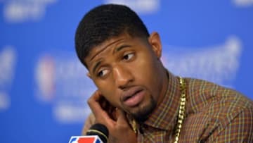 May 24, 2014; Miami, FL, USA; Indiana Pacers forward Paul George talks with the media following the Heat 99-87 victory over the Indiana Pacers in game three of the Eastern Conference Finals of the 2014 NBA Playoffs at American Airlines Arena. Mandatory Credit: Steve Mitchell-USA TODAY Sports