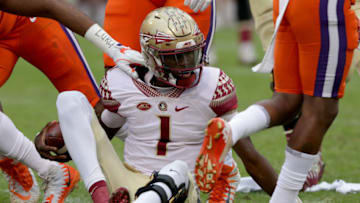CLEMSON, SC - NOVEMBER 11: James Blackman #1 of the Florida State Seminoles is sacked by the defense of the Clemson Tigers during their game at Memorial Stadium on November 11, 2017 in Clemson, South Carolina. (Photo by Streeter Lecka/Getty Images)