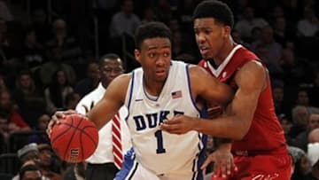 Nov 27, 2013; New York, NY, USA; Duke Blue Devils forward Jabari Parker (1) drives to the basket against Alabama Crimson Tide forward Shannon Hale (11) in the second half of NIT at Madison Square Garden. Duke won 74-64.Mandatory Credit: Noah K. Murray-USA TODAY Sports