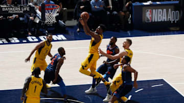 INDIANAPOLIS, IN - DECEMBER 13: Thaddeus Young #21 of the Indiana Pacers drives to the basket during a game against the Oklahoma City Thunder at Bankers Life Fieldhouse on December 13, 2017 in Indianapolis, Indiana. The Thunder defeated the Pacers 100-95. NOTE TO USER: User expressly acknowledges and agrees that, by downloading and or using the photograph, User is consenting to the terms and conditions of the Getty Images License Agreement. (Photo by Joe Robbins/Getty Images)