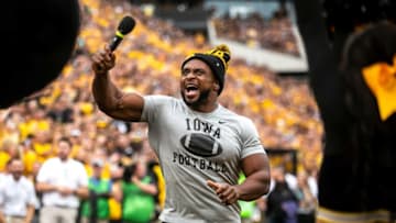 WWE wrestler and former Iowa Hawkeyes football player Ettore "Big E" Ewen pumps up the crowd during a NCAA Big Ten Conference football game against Penn State, Saturday, Oct. 9, 2021, at Kinnick Stadium in Iowa City, Iowa. Iowa beat Penn State, 23-20.211009 Penn St Iowa Fb 050 Jpg