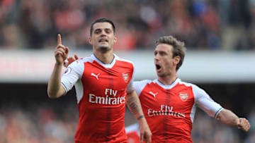LONDON, ENGLAND - MAY 07: Granit Xhaka of Arsenal celebrates scoring his sides first goal with Nacho Monreal of Arsenal during the Premier League match between Arsenal and Manchester United at the Emirates Stadium on May 7, 2017 in London, England. (Photo by Richard Heathcote/Getty Images)