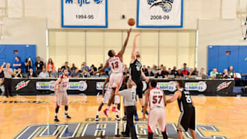 ORLANDO, FL - JULY 2: Bam Adebayo #13 of the Miami Heat and Matt Costello #40 of the Orlando Magic jump for possession during the opening tip-off during the 2017 Summer League on July 2, 2017 at Amway Center in Orlando, Florida. NOTE TO USER: User expressly acknowledges and agrees that, by downloading and or using this photograph, User is consenting to the terms and conditions of the Getty Images License Agreement. Mandatory Copyright Notice: Copyright 2017 NBAE (Photo by Fernando Medina/NBAE via Getty Images)