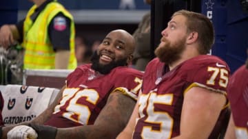 Jan 3, 2016; Arlington, TX, USA; Washington Redskins offensive guard Brandon Scherff (75) and tackle Morgan Moses (76) during the game against the Dallas Cowboys at AT&T Stadium. The Redskins defeat the Cowboys 34-23. Mandatory Credit: Jerome Miron-USA TODAY Sports