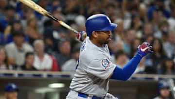SAN DIEGO, CA - JULY 12: Matt Kemp #27 of the Los Angeles Dodgers hits an RBI single during the seventh inning of a baseball game against the San Diego Padres at PETCO Park on July 12, 2018 in San Diego, California. (Photo by Denis Poroy/Getty Images)
