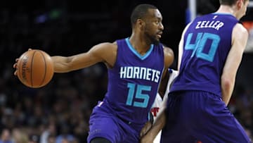 Mar 25, 2016; Auburn Hills, MI, USA; Charlotte Hornets center Cody Zeller (40) sets a pick for guard Kemba Walker (15) during the second quarter against the Detroit Pistons at The Palace of Auburn Hills. Mandatory Credit: Raj Mehta-USA TODAY Sports