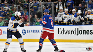 ST. LOUIS, MO - MARCH 17: St. Louis Blues right wing Chris Thorburn (22) and New York Rangers leftwing Cody McLeod (8) get ready to fight during a NHL game between the New York Rangers and the St. Louis Blues on March 17, 2018, at Scottrade Center, St. Louis, MO. St. Louis beat New York in overtime, 4-3. (Photo by Keith Gillett/Icon Sportswire via Getty Images).