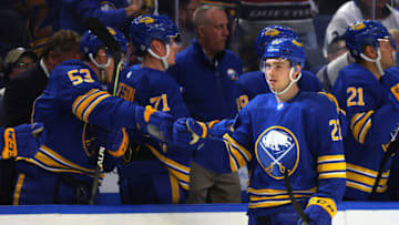 Feb 21, 2023; Buffalo, New York, USA; Buffalo Sabres right wing Jack Quinn (22) celebrates his goal with teammates during the third period against the Toronto Maple Leafs at KeyBank Center. Mandatory Credit: Timothy T. Ludwig-USA TODAY Sports