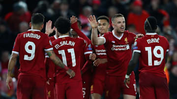 LIVERPOOL, ENGLAND - APRIL 24: Sadio Mane of Liverpool (19) celebrates after scoring his sides third goal with team mates during the UEFA Champions League Semi Final First Leg match between Liverpool and A.S. Roma at Anfield on April 24, 2018 in Liverpool, United Kingdom. (Photo by Clive Brunskill/Getty Images)