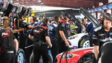 TALLADEGA, AL - OCTOBER 13: Crew members work in the garage during practice for the 1000Bulbs.com 500 on October 13, 2018, at Talladega Superspeedway in Talladega, AL.(Photo by Jeffrey Vest/Icon Sportswire via Getty Images)