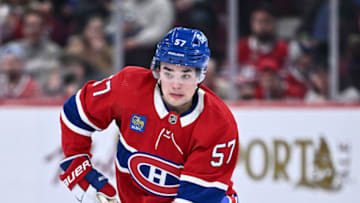 MONTREAL, CANADA - MARCH 30: Sean Farrell #57 of the Montreal Canadiens skates the puck during the second period against the Florida Panthers at Centre Bell on March 30, 2023 in Montreal, Quebec, Canada. The Florida Panthers defeated the Montreal Canadiens 5-2. (Photo by Minas Panagiotakis/Getty Images)