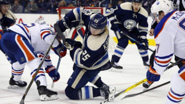 Jan 3, 2017; Columbus, OH, USA; Columbus Blue Jackets center William Karlsson (25) tries to control the puck on a face-off against the Edmonton Oilers during the second period at Nationwide Arena. Mandatory Credit: Russell LaBounty-USA TODAY Sports