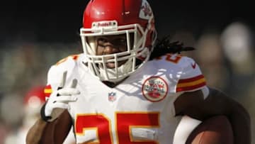 Dec 15, 2013; Oakland, CA, USA; Kansas City Chiefs running back Jamaal Charles (25) runs for a touchdown after catching a pass against the Oakland Raiders in the first quarter at O.co Coliseum. Mandatory Credit: Cary Edmondson-USA TODAY Sports