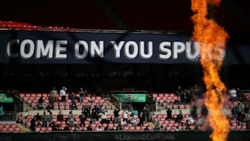 A banner reads "Come on you Spurs' as fans wait for kick off in the the English League Cup final football match between Manchester City and Tottenham Hotspur at Wembley Stadium, northwest London on April 25, 2021. - - RESTRICTED TO EDITORIAL USE. No use with unauthorized audio, video, data, fixture lists, club/league logos or 'live' services. Online in-match use limited to 120 images. An additional 40 images may be used in extra time. No video emulation. Social media in-match use limited to 120 images. An additional 40 images may be used in extra time. No use in betting publications, games or single club/league/player publications. (Photo by CARL RECINE / POOL / AFP) / RESTRICTED TO EDITORIAL USE. No use with unauthorized audio, video, data, fixture lists, club/league logos or 'live' services. Online in-match use limited to 120 images. An additional 40 images may be used in extra time. No video emulation. Social media in-match use limited to 120 images. An additional 40 images may be used in extra time. No use in betting publications, games or single club/league/player publications. / RESTRICTED TO EDITORIAL USE. No use with unauthorized audio, video, data, fixture lists, club/league logos or 'live' services. Online in-match use limited to 120 images. An additional 40 images may be used in extra time. No video emulation. Social media in-match use limited to 120 images. An additional 40 images may be used in extra time. No use in betting publications, games or single club/league/player publications. (Photo by CARL RECINE/POOL/AFP via Getty Images)