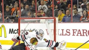 Mar 25, 2015; Philadelphia, PA, USA; Chicago Blackhawks goalie Corey Crawford (50) makes a save against the Philadelphia Flyers during the second period at Wells Fargo Center. Mandatory Credit: Eric Hartline-USA TODAY Sports