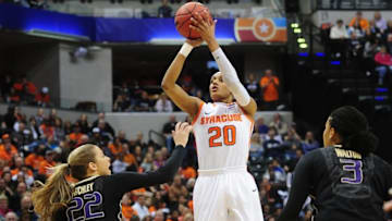 Apr 3, 2016; Indianapolis, IN, USA; Syracuse Orange guard Brittney Sykes (20) shoots the ball between Washington Huskies guard Alexus Atchley (22) and forward Talia Walton (3) during the first quarter at Bankers Life Fieldhouse. Mandatory Credit: Thomas J. Russo-USA TODAY Sports