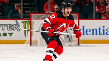 NEWARK, NJ - FEBRUARY 10: Ben Lovejoy #12 of the New Jersey Devils against the Carolina Hurricanes during the first period at the Prudential Center on February 10, 2019 in Newark, New Jersey. (Photo by Adam Hunger/Getty Images)