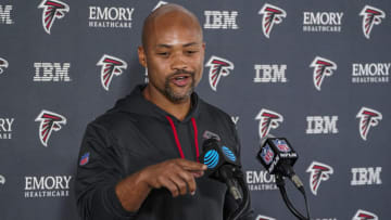 Aug 1, 2022; Flowery Branch, GA, USA; Atlanta Falcons general manager Terry Fontenot shown being interviewed by the media during training camp at IBM Performance Field. Mandatory Credit: Dale Zanine-USA TODAY Sports