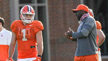 Clemson running back Will Shipley (1) listens to running backs coach C.J. Spiller during football practice on March 5.Clemson Spring Football Practice