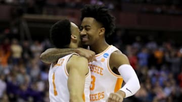 COLUMBUS, OHIO - MARCH 24: Lamonte Turner #1 and Jordan Bowden #23 of the Tennessee Volunteers react after defeating the Iowa Hawkeyes 83-77 in the Second Round of the NCAA Basketball Tournament at Nationwide Arena on March 24, 2019 in Columbus, Ohio. (Photo by Elsa/Getty Images)