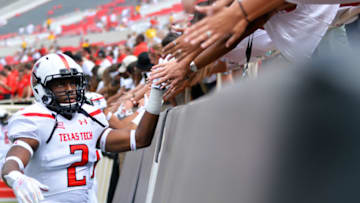 LUBBOCK, TX - SEPTEMBER 12: The Texas Tech Red Raiders interact with fans prior to the game against the UTEP Miners on September 12, 2015 at Jones AT&T Stadium in Lubbock, Texas. Texas Tech won the game 69-20. (Photo by John Weast/Getty Images)