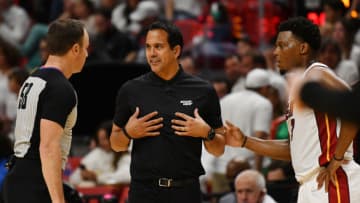 Miami Heat head coach Erik Spoelstra has a conversation with an official as Miami Heat guard Kyle Lowry (7) looks on(Jim Rassol-USA TODAY Sports)