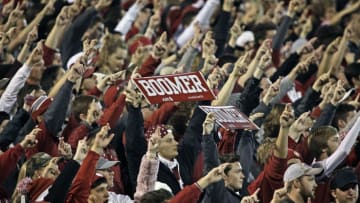 NORMAN, OK - NOVEMBER 11: Oklahoma Sooners fans cheer during the game against the TCU Horned Frogs at Gaylord Family Oklahoma Memorial Stadium on November 11, 2017 in Norman, Oklahoma. Oklahoma defeated TCU 38-20. (Photo by Brett Deering/Getty Images) *** Local Caption ***