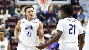 Nov 21, 2015; Uncasville, CT, USA; Old Dominion Monarchs forward Stephen Vassor (23) and forward Denzell Taylor (21) celebrate against the Purdue Boilermakers during the first half at Mohegan Sun Arena. Mandatory Credit: Mark L. Baer-USA TODAY Sports