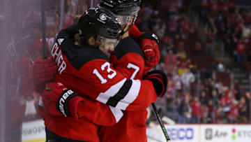 Oct 31, 2021; Newark, New Jersey, USA; The New Jersey Devils celebrate a goal by defenseman Dougie Hamilton (7) against the Columbus Blue Jackets during the second period at Prudential Center. Mandatory Credit: Ed Mulholland-USA TODAY Sports