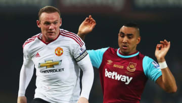 LONDON, ENGLAND - MAY 10: Wayne Rooney of Manchester United evades Dimitri Payet of West Ham United during the Barclays Premier League match between West Ham United and Manchester United at the Boleyn Ground on May 10, 2016 in London, England. West Ham United are playing their last ever home match at the Boleyn Ground after their 112 year stay at the stadium. The Hammers will move to the Olympic Stadium for the 2016-17 season. (Photo by Julian Finney/Getty Images)