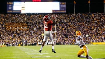 Nov 8, 2014; Baton Rouge, LA, USA; Alabama Crimson Tide wide receiver DeAndrew White (2) catches a touchdown over LSU Tigers safety Jalen Mills (28) during the overtime of a game at Tiger Stadium. Alabama defeated LSU 20-13 in overtime. Mandatory Credit: Derick E. Hingle-USA TODAY Sports