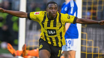 Dortmund's German forward Youssoufa Moukoko celebrates scoring the opening goal during the German first division Bundesliga football match between BVB Borussia Dortmund and FC Schalke 04 in Dortmund, western Germany, on September 17, 2022. - - DFL REGULATIONS PROHIBIT ANY USE OF PHOTOGRAPHS AS IMAGE SEQUENCES AND/OR QUASI-VIDEO ALTERNATIVE CROP (Photo by SASCHA SCHUERMANN / AFP) / DFL REGULATIONS PROHIBIT ANY USE OF PHOTOGRAPHS AS IMAGE SEQUENCES AND/OR QUASI-VIDEO ALTERNATIVE CROP (Photo by SASCHA SCHUERMANN/AFP via Getty Images)