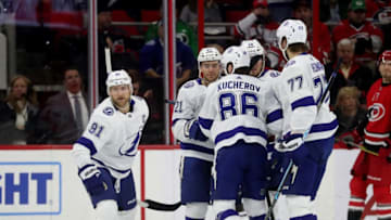 RALEIGH, NC - MARCH 21: Steven Stamkos #91 of the Tampa Bay Lightning celebrates with teammates after scoring a goal during an NHL game against the Carolina Hurricanes on March 21, 2019 at PNC Arena in Raleigh, North Carolina. (Photo by Gregg Forwerck/NHLI via Getty Images)