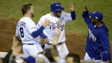 Oct 28, 2014; Kansas City, MO, USA; Kansas City Royals first baseman Eric Hosmer (35) celebrates with teammates after scoring a run against the San Francisco Giants in the second inning during game six of the 2014 World Series at Kauffman Stadium. Mandatory Credit: Christopher Hanewinckel-USA TODAY Sports