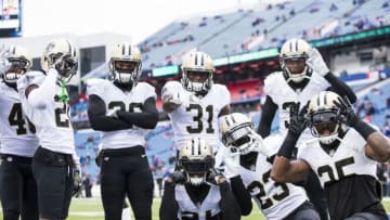 ORCHARD PARK, NY - NOVEMBER 12: New Orleans Saints players pose for a photograph without cause before the game against the Buffalo Bills at New Era Field on November 12, 2017 in Orchard Park, New York. New Orleans defeats Buffalo 47-10. (Photo by Brett Carlsen/Getty Images)