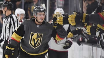 LAS VEGAS, NV - SEPTEMBER 16: Erik Brannstrom #12 of the Vegas Golden Knights celebrates with teammates on the bench after scoring a third-period power-play goal against the Arizona Coyotes during their preseason game at T-Mobile Arena on September 16, 2018 in Las Vegas, Nevada. The Golden Knights defeated the Coyotes 7-2. (Photo by Ethan Miller/Getty Images)