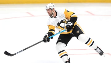 ANAHEIM, CALIFORNIA - FEBRUARY 28: Justin Schultz #4 of the Pittsburgh Penguins passes the puck during the third period of a game against the Anaheim Ducks at Honda Center on February 28, 2020 in Anaheim, California. (Photo by Sean M. Haffey/Getty Images)