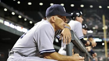 Sep 9, 2013; Baltimore, MD, USA; New York Yankees manager Joe Girardi (28) in the dugout during the third inning against the Baltimore Orioles at Oriole Park at Camden Yards. Mandatory Credit: Joy R. Absalon-USA TODAY Sports