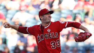 ANAHEIM, CALIFORNIA - JULY 13: Pitcher Matt Harvey #33 of the Los Angeles Angels of Anaheim pitches in the first innning of the MLB game against the Seattle Mariners at Angel Stadium of Anaheim on July 13, 2019 in Anaheim, California. (Photo by Victor Decolongon/Getty Images)