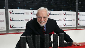 NEW YORK, NY - MARCH 18: Hockey writer, broadcaster and historian Stan Fischler poses for photos on the ice at the Barclays Center on March 18, 2018 in the Brooklyn borough of New York City. (Photo by Bruce Bennett/Getty Images)