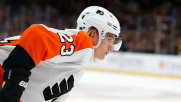 BOSTON, MA - OCTOBER 25: Philadelphia Flyers left wing Oskar Lindblom (23) eyes a face off during a game between the Boston Bruins and the Philadelphia Flyers on October 25, 2018, at TD Garden in Boston, Massachusetts. The Bruins defeated the Flyers 3-0. (Photo by Fred Kfoury III/Icon Sportswire via Getty Images)