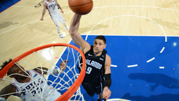 PHILADELPHIA,PA - NOVEMBER 25 : Nikola Vucevic #9 of the Orlando Magic goes up for the dunk against the Philadelphia 76ers at Wells Fargo Center on November 25, 2017 in Philadelphia, Pennsylvania NOTE TO USER: User expressly acknowledges and agrees that, by downloading and/or using this Photograph, user is consenting to the terms and conditions of the Getty Images License Agreement. Mandatory Copyright Notice: Copyright 2017 NBAE (Photo by Jesse D. Garrabrant/NBAE via Getty Images)