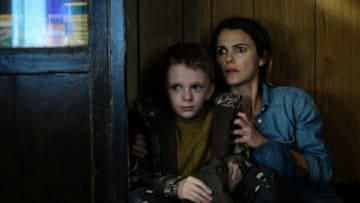 Jeremy T. Thomas and Keri Russell in the film ANTLERS. Photo by Kimberley French. © 2021 20th Century Studios All Rights Reserved