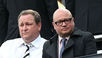 Newcastle United's English owner Mike Ashley (L) sits with managing director Lee Charnley (R) as he waits for the kick off in the English Premier League football match between Newcastle United and West Ham United at St James Park, Newcastle-Upon-Tyne, north east England on May 24, 2015. AFP PHOTO / IAN MACNICOL RESTRICTED TO EDITORIAL USE. NO USE WITH UNAUTHORIZED AUDIO, VIDEO, DATA, FIXTURE LISTS, CLUB/LEAGUE LOGOS OR LIVE SERVICES. ONLINE IN-MATCH USE LIMITED TO 45 IMAGES, NO VIDEO EMULATION. NO USE IN BETTING, GAMES OR SINGLE CLUB/LEAGUE/PLAYER PUBLICATIONS. (Photo credit should read Ian MacNicol/AFP/Getty Images)