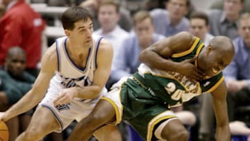 Gary Payton, John Stockton, Chicago Bulls (Photo credit should read GEORGE FREY/AFP via Getty Images)