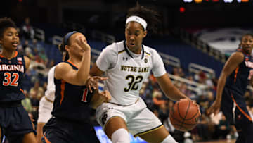 GREENSBORO, NC - MARCH 02: Notre Dame Fighting Irish forward Danielle Patterson (32) positions for a shot against Virginia Cavaliers guard Brianna Tinsley (1) during the ACC women's tournament game between the Virginia Cavaliers and the Notre Dame Fighting Irish on March 2, 2018, at Greensboro Coliseum Complex in Greensboro, NC. (Photo by William Howard/Icon Sportswire via Getty Images)