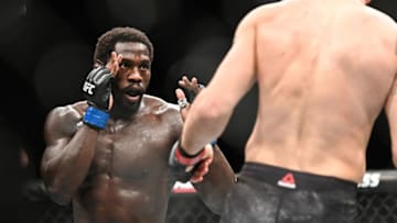 Sep 28, 2019; Copenhagen, DEN; Jack Hermansson (red gloves) fights Jared Cannonier (blue gloves) during UFC Fight Night at Royal Arena. Mandatory Credit: Per Haljestam-USA TODAY Sports